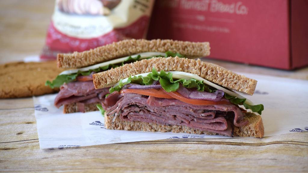 Roast Beef & Cheese  · Roast beef, spinach, tomato, red onion, Dijon mustard, mayo, provolone cheese on our Honey Whole Wheat bread.