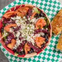 Greek Salad · Lettuce, tomato, black olives, pepperoncini, onion, beets, and feta cheese