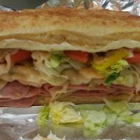 Ham And Turkey Grinder · Ham, turkey, provolone cheese, lettuce, tomato, and mayo on the side