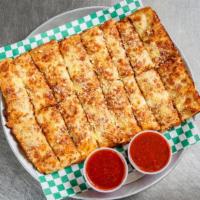 Cheese Bread · Cheese, garlic, butter, and parmesan 
Comes with Ranch or Marinara