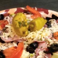 Antipasto Salad · Lettuce, tomato, ham, salami, black olives, pepperoncini, and cheese