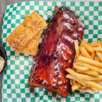 Half Slab · About 6-7 bones of ribs, french fries, coleslaw, and garlic bread