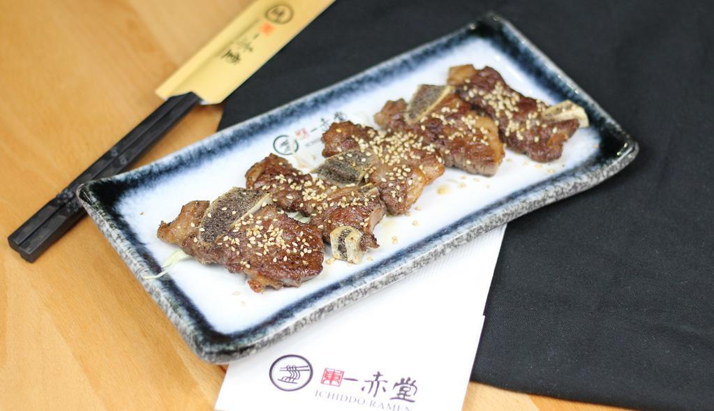 Short Ribs (4 Pc) · Fried Japanese style marinated with sesame seeds.