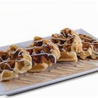 Nanna'S Cinn Rolls · Made-from-scratch cinnamon rolls. waffled and topped with sweet icing.