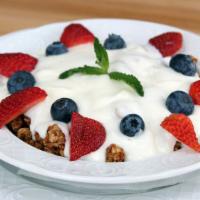 House Parfaits (V) · Vanilla bean yogurt, granola, seasonal berries, mint.