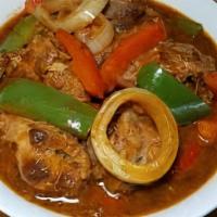 Turkey Stew · Turkey stew is a savory flavored sauce served with white rice or rice and beans and a side o...