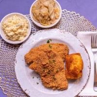 Fried Tilapia Meal · comes with 2 pieces of tilapia 2 sides and bread