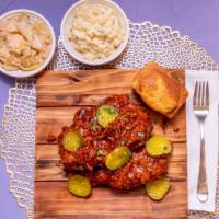 Nashville Hot Chicken Meal · comes with 3 tenders in our Nashville Hot sauce with pickles bread and 2 sides