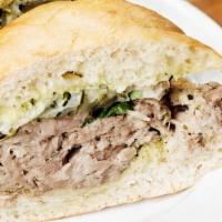 Slow Roasted Pork Sandwich · Pickles, Cilantro & Green Sauce
