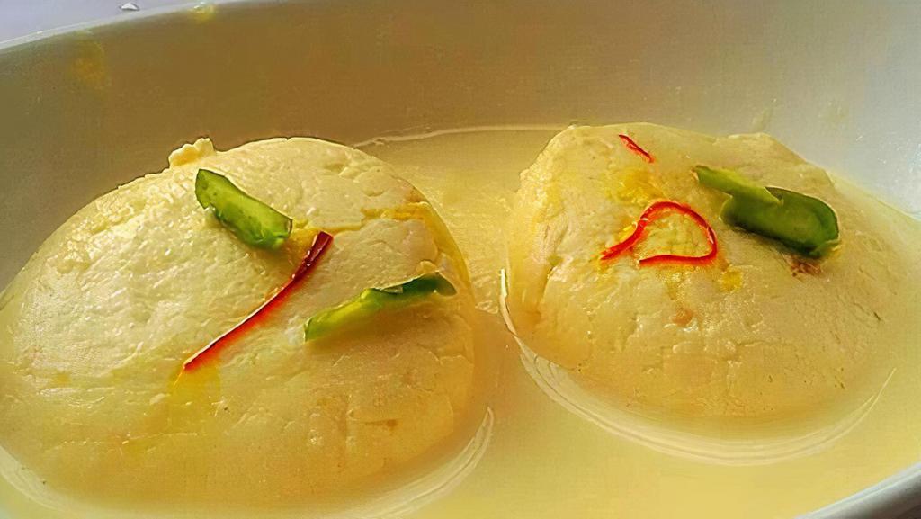 Rasmalai · Flat, round discs of Indian cottage cheese poached in milk