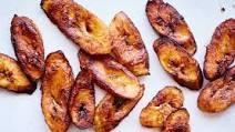 Maduros (V) · Fried soft, sweet plantains.