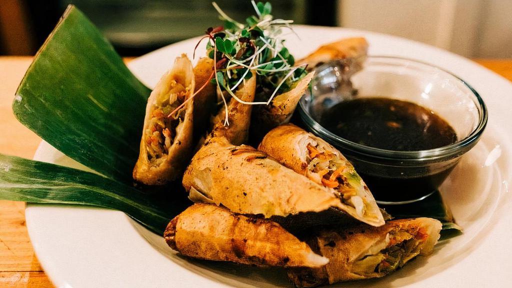 Fried Rolls - 1 · A traditional Filipino fried roll with carrots, cabbage, celery, and onionVeggie or veggie + ground pork option(contains fish sauce)Served with a dipping sauce