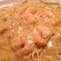 Shrimp Scampi · Large shrimp sauteed with garlic, lemon and white wine. Served over your choice of pasta.
