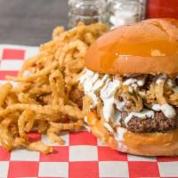 Sizzler Burger Wednesday Only · Sizzler!!!! Pepper jack cheese smothered patty, fried jalapeños, haystack onion rings, drizz...