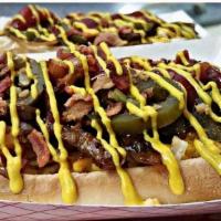 Loaded Polish · A polish sausage topped with caramelized onions, cheese, bacon, jalapenos, mustard, and ketc...