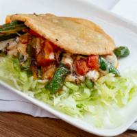 Gorditas · Pocket tortilla shell stuffed with your choice of meat.