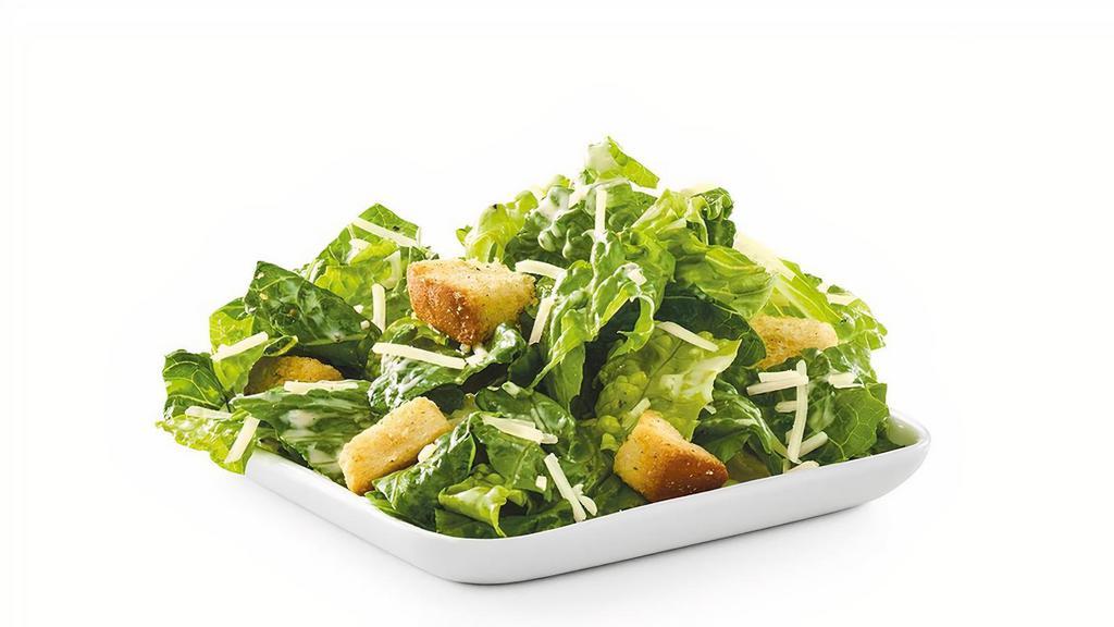 Traditional Caesar · Romaine lettuce, croutons and shredded Parmesan with Caesar dressing.
