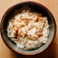 Rice Pudding · Whipped coconut mousseline and young coconut. Vegetarian. Gluten-free. Contains sesame, tree...