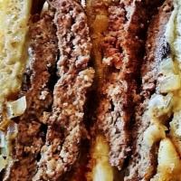 Patty Melt* · topped with grilled onions & swiss cheese served on grilled rye bread.