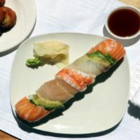 J Rainbow Roll · Inside: California Roll 
Outside: Avocado, Chef's Choice Fish, Green Onions, Masago, Sesame ...