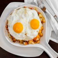 Gypsy Skillet · Diced potatoes, diced ham, green peppers, onions, cheddar cheese, topped with two eggs your ...
