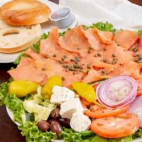 Lots Of Lox Platter · Lox served with a bagel, cream cheese, onion, olives, tomatoes and capers.