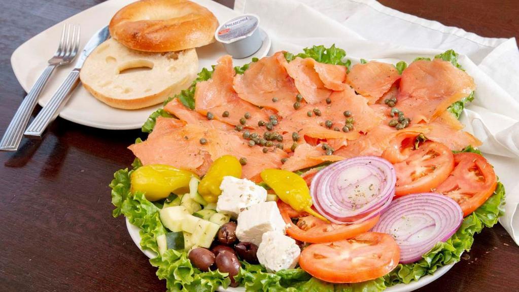 Lots Of Lox Platter · Lox served with a bagel, cream cheese, onion, olives, tomatoes and capers.