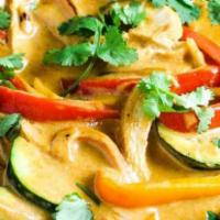 Xmas Curry · Garlic ginger lemongrass red bell peppers zucchini coconut milk curry basil mint cilantro.