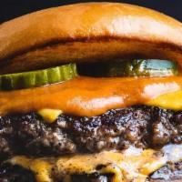Crisco'S Double Cheeseburger · Two fresh seasoned patty on a brioche bun with famous (criscos sauce) or mayo, pickle, slice...