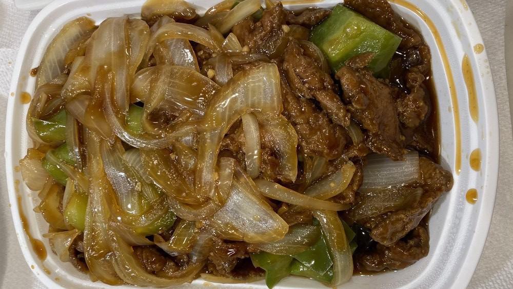 Pepper Steak · Sliced steak stir- fried with green pepper and onions in tasty brown sauce.