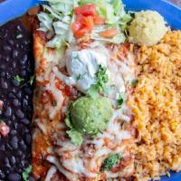 Cheese & Bean Burrito · Topped with enchilada sauce. Served with refried beans and rice.