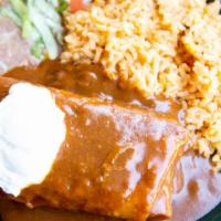 Traditional Chimichanga · Classic favorite! Served with your choice of ground beef, shredded chicken or barbacoa toppe...