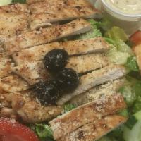 Chicken Salad Grilled · Crisp romaine lettuce, red onions and cheese tossed with dressing of your choice and topped ...