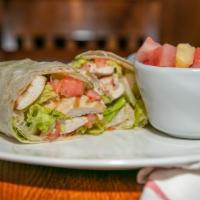Chicken Caesar Wrap · Crisp romaine, diced tomato with caesar dressing and freshly grated Parmesan cheese wrapped ...
