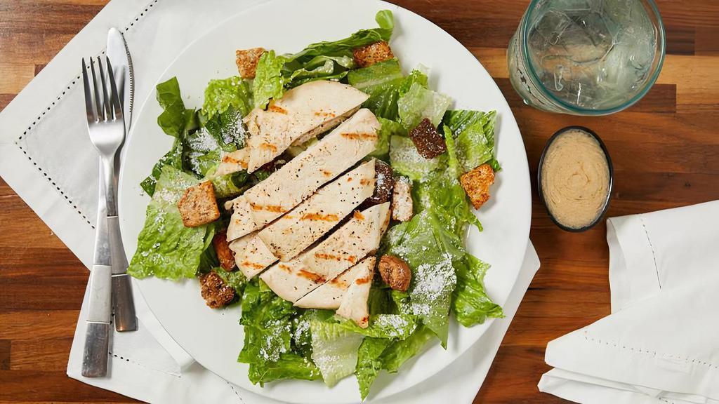 Caesar Salad · Crisp romaine, parmesan, croutons, and nonna's Caesar dressing.