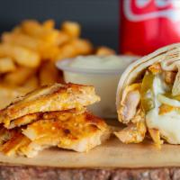 Chicken Shawarma (Combo) · Marinated thin slices of chicken cooked on a rotisserie and served in bread with pickles and...