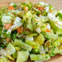 Jerusalem Salad · Freshly diced cucumbers, tomatoes, lettuce, and parsley with a homemade vinaigrette dressing