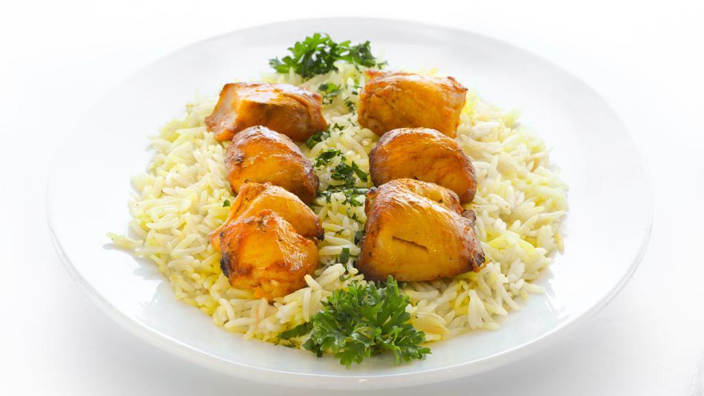 Chicken Sheesh Tawook · Cubes of chicken breast, seasoned with Middle Eastern spices, skewered and grilled.