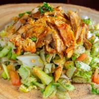 Go Healthy · Our Jerusalem salad topped with either chicken or beef shawarma, comes with tahini or garlic...