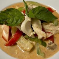 Red Curry · Spicy. A rich coconut red curry stewed with bell pepper, bamboo shoots, basil, baby corn, an...