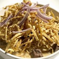 Khao Soy (Bow) · Spicy. A specialty from northern Thailand, crispy and soft noodle with coconut yellow sauce,...