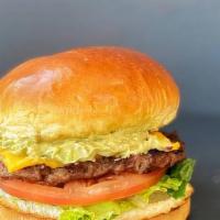 A. Burger · 6 oz. Juicy steakburger, homemade avocado spread, lettuce, tomato, and American cheese.