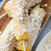 Mexican Street Corn · MEXICAN STREET CORN - corn is tossed with mayonnaise, cotija cheese, lime juice, and chill