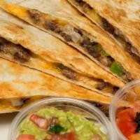 Quesadilla Gringas · A Flour Tortilla with Melted Chihuahua Cheese and 
Your choice of Meat: Carne Asada, Pastor,...