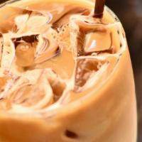 Iced Coffee · Freshly brewed and full of flavor, Choose your flavor, French Vanilla, Hazelnut. Milk or Cre...