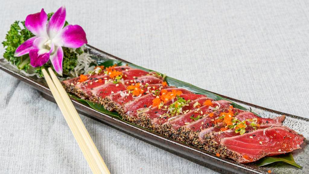 Tuna Tataki (12) · Pepper seared bigeye tuna topped w. masago, scallion, ponzu sauce.