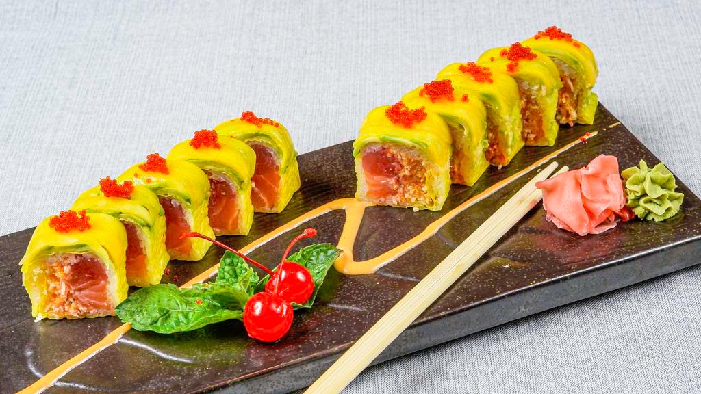 Pikachu Roll (10) (Spicy) · Salmon, tuna, spicy crunch krab stick in soy paper, topped w. avocado, mango, red tobiko.