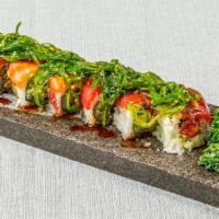 Japanica Roll (8) · Eel, crispy crunch topped w. salmon, tuna, seaweed salad, eel sauce.