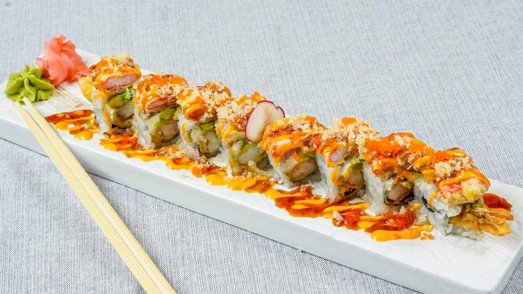Madame Butterfly Roll (8) (Spicy) · Spicy. Shrimp tempura, avocado, cream cheese, topped w. deep fried crispy krab stick, crunch, eel sauce, spicy mayo and masago.