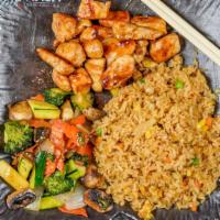 Hibachi Chicken · Gilled in our special hibachi sauce w. Fried rice or steamed rice and vegetable. Served w. c...